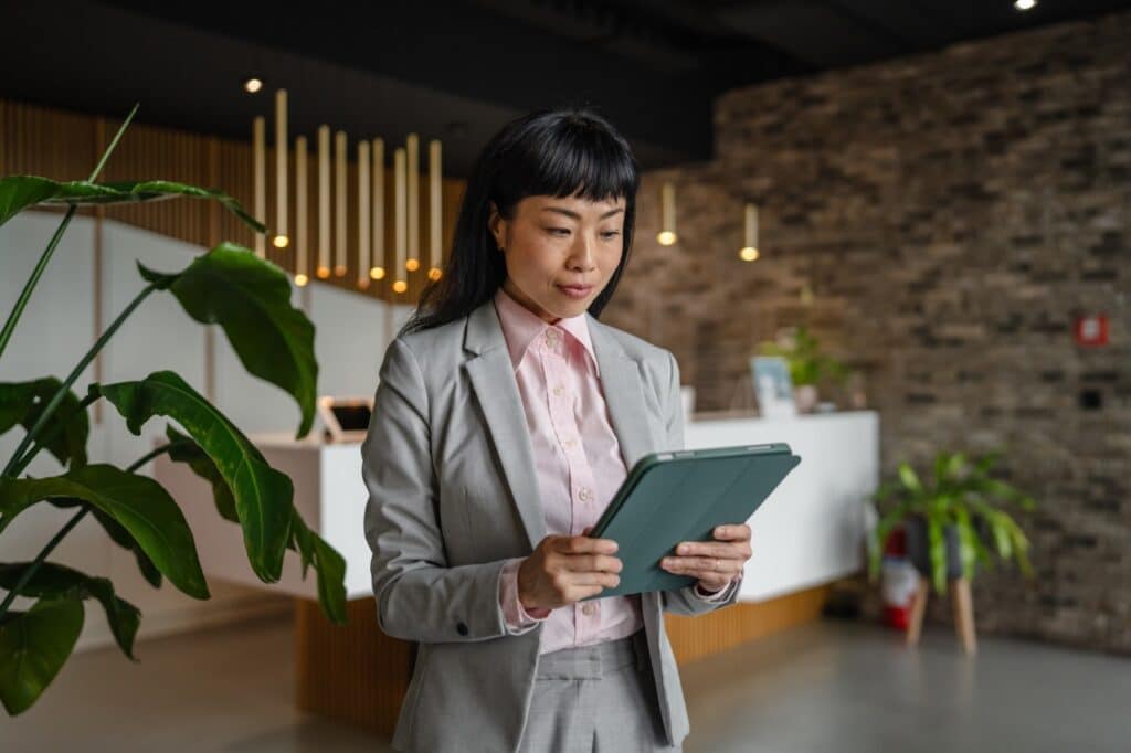 IT manager reviewing a device lifecycle policy covering procurement through decommission